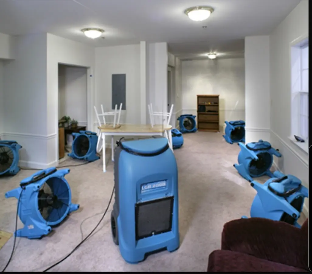 Air movers and dehumidifier setup for Water Extraction & Removal in Midway City